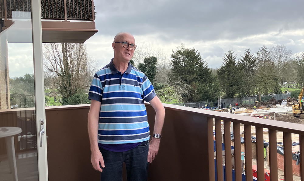 Eric on his balcony
